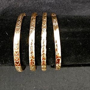 Set of 4 Gold Tone Cuff Bracelets